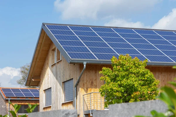 solar panel of modern building facades and details of village in south german bavaria countryside