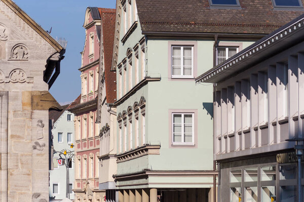 On a very sunny day end of may in south german historical city ancient facades and roofs of pastell colors are inspiring views of contemplation