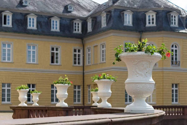 in fornt of a historical building in sough germany white decoration looks wiht contrast and romantic vintage style