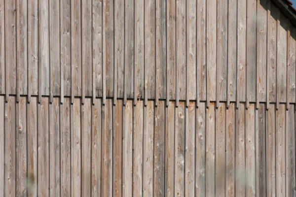 solid background of wooden planks on a hut in south germany