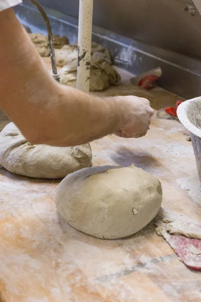 preparation of baked goods in a bakery with tools for preparing pastries