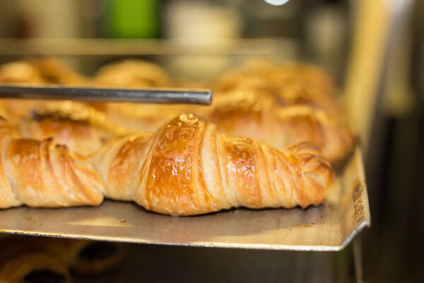 baking pastries and bread in an oven with gold brown delicious colors at a bakery in south germany