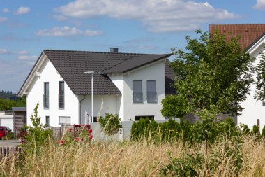 garden fence of modern house architecture in rural countryside at springtime in south germany near city stuttgart