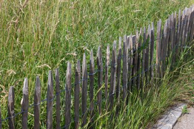 garden fence of modern house architecture in rural countryside at springtime in south germany near city stuttgart