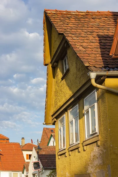 rooftops with antenna of old buildings at sunny afternoon in south germany