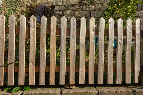 rustic fence in garden at rural countryside of south germany