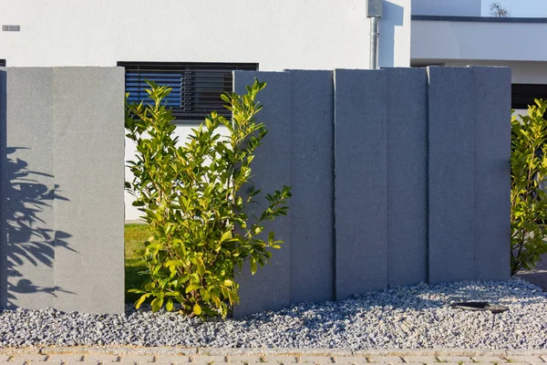 Modern house building with green bushes — Stock Photo, Image