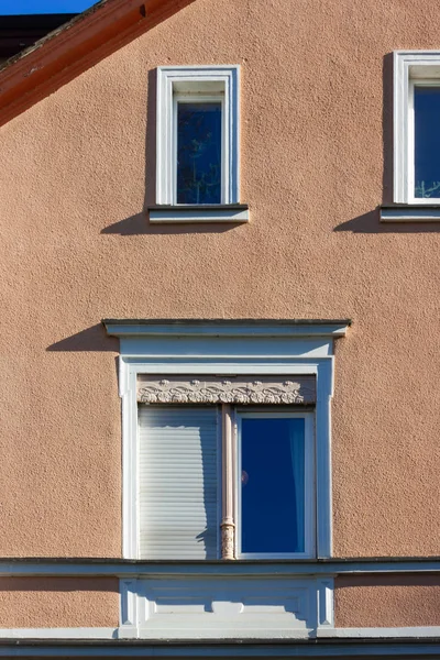 Historical city facades with windows balcony doors — Stock Photo, Image
