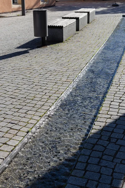 water stream in pedestrian area