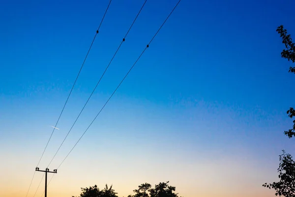 Telegraf Pole vid färgglada solnedgång — Stockfoto