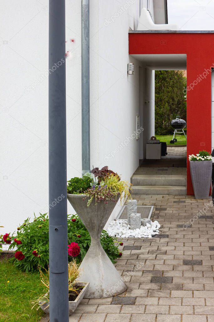house entrance of new modern building in germany springtime