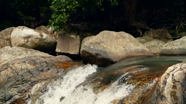 Magical river with rocks. Fast rocky clear crystal stream with rapids. Steam with cascades. Splashes of falling water. — Stock Video