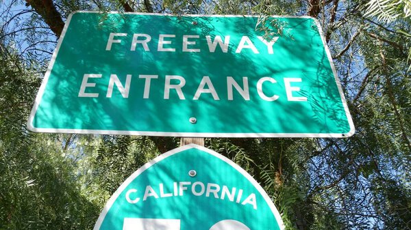 Freeway entrance sign on interchange crossraod in San Diego county, California USA. State Route highway 78 signpost plate. Symbol of road trip, transportation and traffic safety rules and regulations.