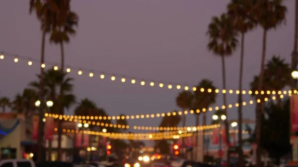 Decorative Staring Garland Lights Palm Trees Silhouettes Evening Sky Blurred — Stock Photo, Image