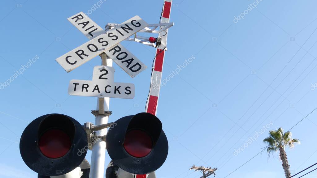 Level Crossing Warning Signal In Usa Crossbuck Notice And Red Traffic Light On Rail Road Intersection In California Railway Transportation Safety Symbol Caution Sign About Hazard And Train Track Level Crossing Warning Signal In Usa Crossbuck Notice And Red Traffic Light On Rail Road Intersection In California Railway Transportation Safety Symbol Caution Sign About Hazard And Train Track