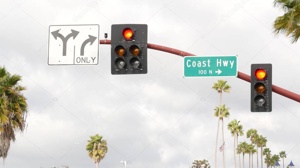 Pacific Coast Highway, historic route 101 road sign, tourist destination in California USA. Lettering on intersection signpost. Symbol of summertime travel along the ocean. All-American scenic hwy.