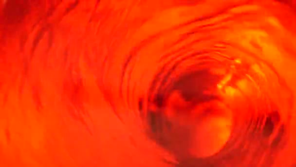 Symbol piekła, piekła i nieskończoności. Czerwony płyn hipnotyzujący kręci się w pętli wodnej. Medytacyjny wir świetlny. Fascynujący spiralny tunel z krystalicznym płynem. Ognisty surrealistyczny gradient wody rytmicznej — Wideo stockowe