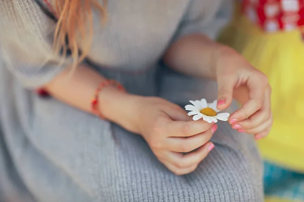 Cute Little Girl Guessing Chamomile Flower — Stock Photo, Image