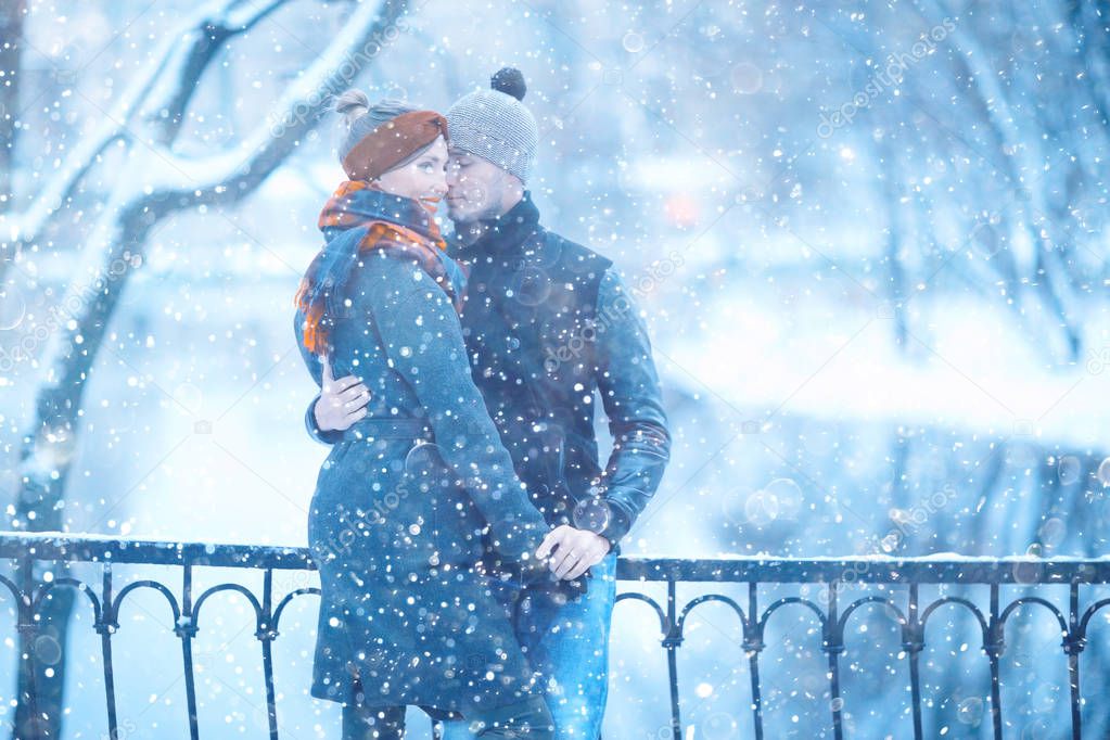 young man and woman walking in autumn city, romantic happy couple 