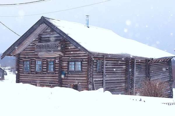wooden houses of the Russian countryside, wooden architecture, winter landscape in Russian village