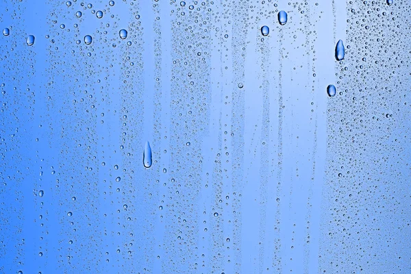 Latar Belakang Basah Biru Tetes Hujan Pada Kaca Jendela Konsep — Stok Foto