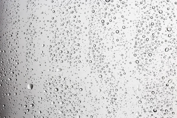 Sfondo Grigio Bagnato Gocce Pioggia Sul Vetro Della Finestra Concetto — Foto Stock