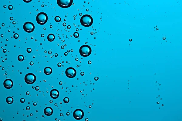 Μπλε Φόντο Υγρό Σταγόνες Βροχής Τζάμι Έννοια Του Τον Καιρό — Φωτογραφία Αρχείου