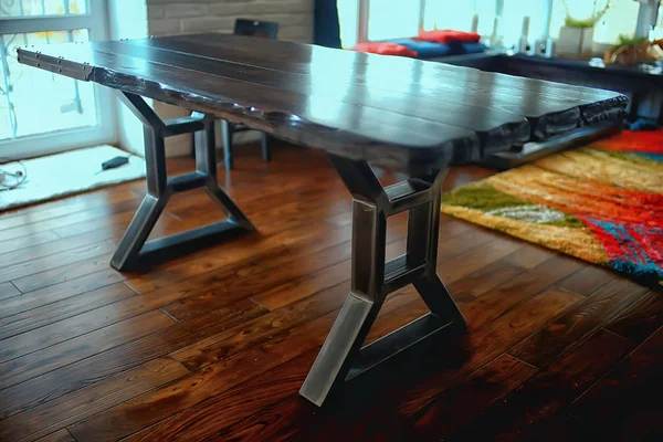 wooden table in loft style, aged wood and metal table design