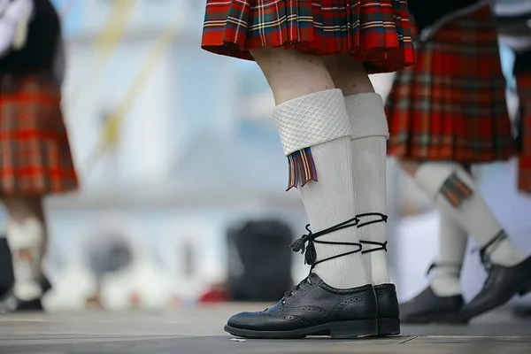 feet in Scottish skirts, the Scottish National Orchestra plays on St. Patrick\'s Day, holiday costumes for men