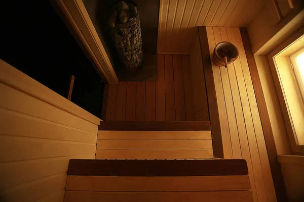 sauna, wooden interior baths, wooden benches and loungers accessories for sauna, spa complex in the hotel