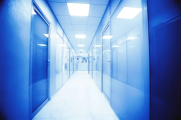 door glass plastic corridor, new office building, office rental, light blurred corridor background