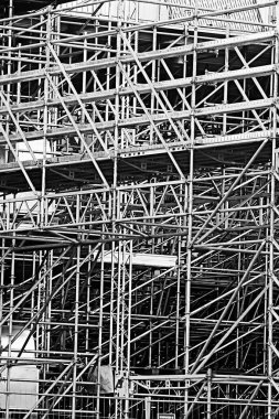 Metal Prefabrik yapılar, arka plan metal kiriş ve borular geçici yapıların inşaat prefabrik endüstriyel yapılarda