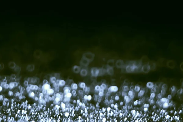 Anillos Bokeh Blancos Sobre Fondo Oscuro —  Fotos de Stock