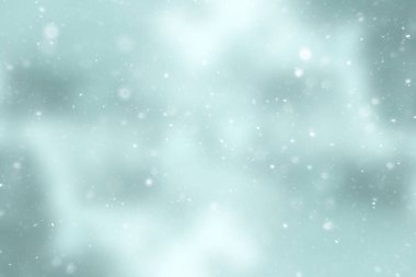 bulanık kar / soyut kış arka plan, arka bulanık parlayan yaprak plan üzerinde kar taneleri