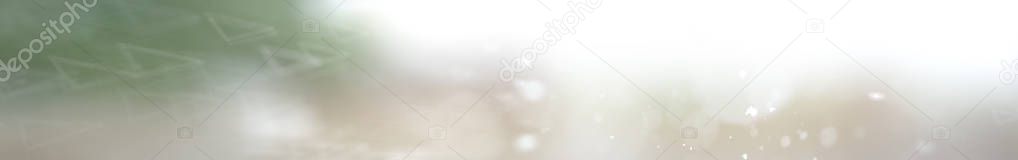 abstract narrow long background / glowing blurred winter background, snowflakes on a blurred multicolored background, abstraction winter