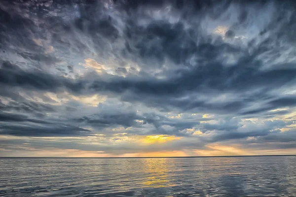 sky above water / texture background, horizon sky with clouds on the lake