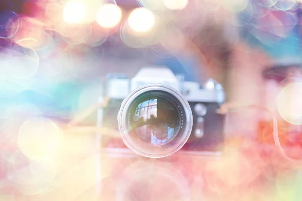 blurred background with vintage camera / photo old camera, unusual vintage, hipster camera