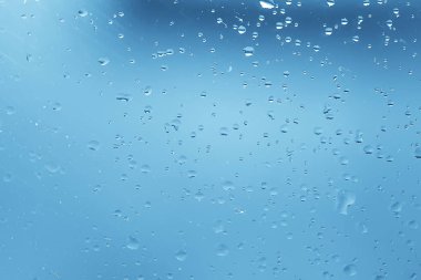 ıslak cam arka plan yoğunlaşır / soyut yağmur, şeffaf cam üzerine doku damlatır