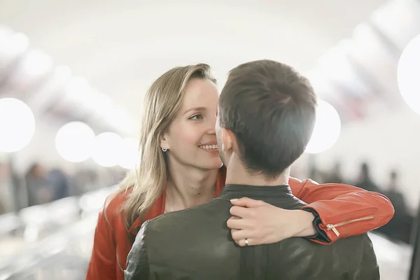 couple in love on a walk in Rome, Italy / young lovers hug, hug and love