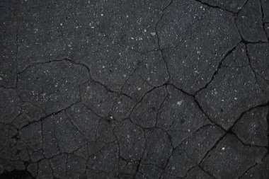 asfalt yolda çatlaklar doku / soyut arka plan çatlakları asfalt asfalt