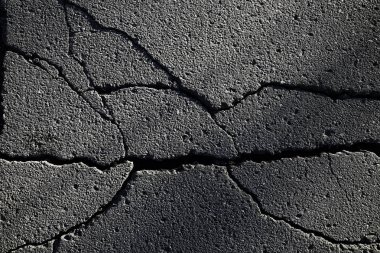 asfalt yolda çatlaklar doku / soyut arka plan çatlakları asfalt asfalt
