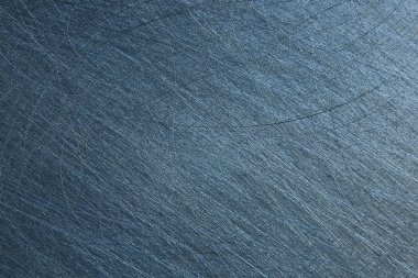 Metal, metaldeki mavi arkaplan çiziklerini soyut / boş çerçeve çizer