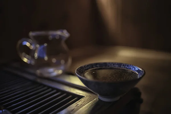 Chinese tea ceremony, tea table, cup / teapot on the table, oriental traditions