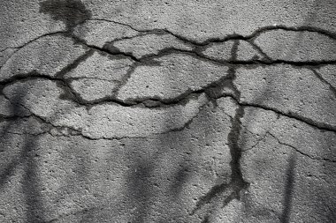 asfalt yolda çatlaklar doku / soyut arka plan çatlakları asfalt asfalt