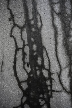 asfalt yolda çatlaklar doku / soyut arka plan çatlakları asfalt asfalt