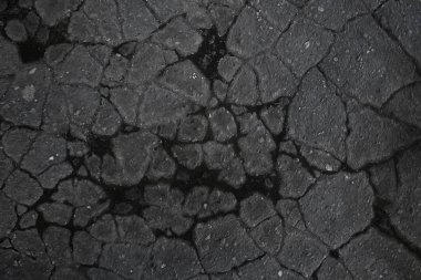 asfalt yolda çatlaklar doku / soyut arka plan çatlakları asfalt asfalt