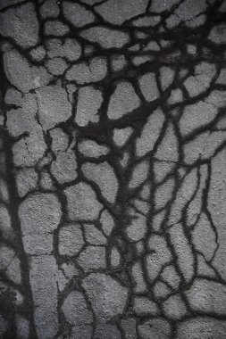 asfalt yolda çatlaklar doku / soyut arka plan çatlakları asfalt asfalt