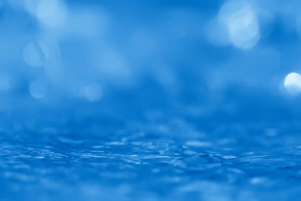 концепция синего абстрактного фона вода / океан, озерные волны на воде, отражение рябь на реке

