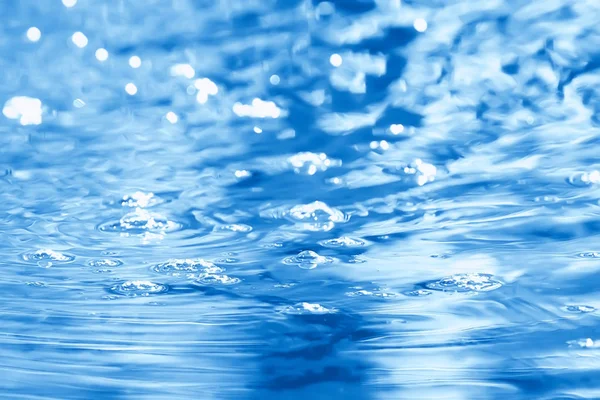 concept blue abstract background water / ocean, lake waves on water, reflection of ripples on the river