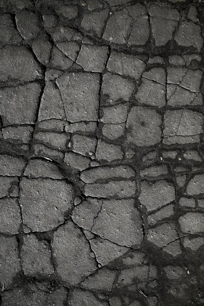 asfalt yolda çatlaklar doku / soyut arka plan çatlakları asfalt asfalt